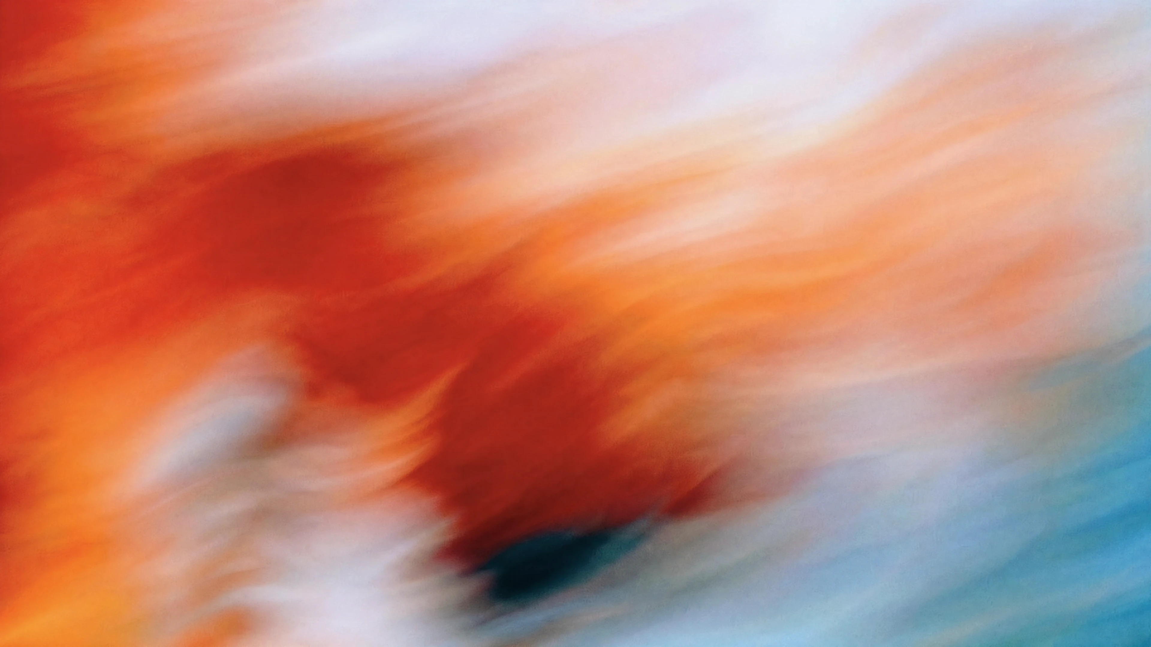 A painterly field of red and blue motion behind the source workspace